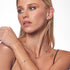 Woman Wearing 9 Carat Yellow Gold Malachite Flower Petal Bracelet