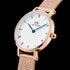 DANIEL WELLINGTON PETITE ROMAN NUMERALS ROSE GOLD WHITE DIAL WATCH - ANGLE VIEW