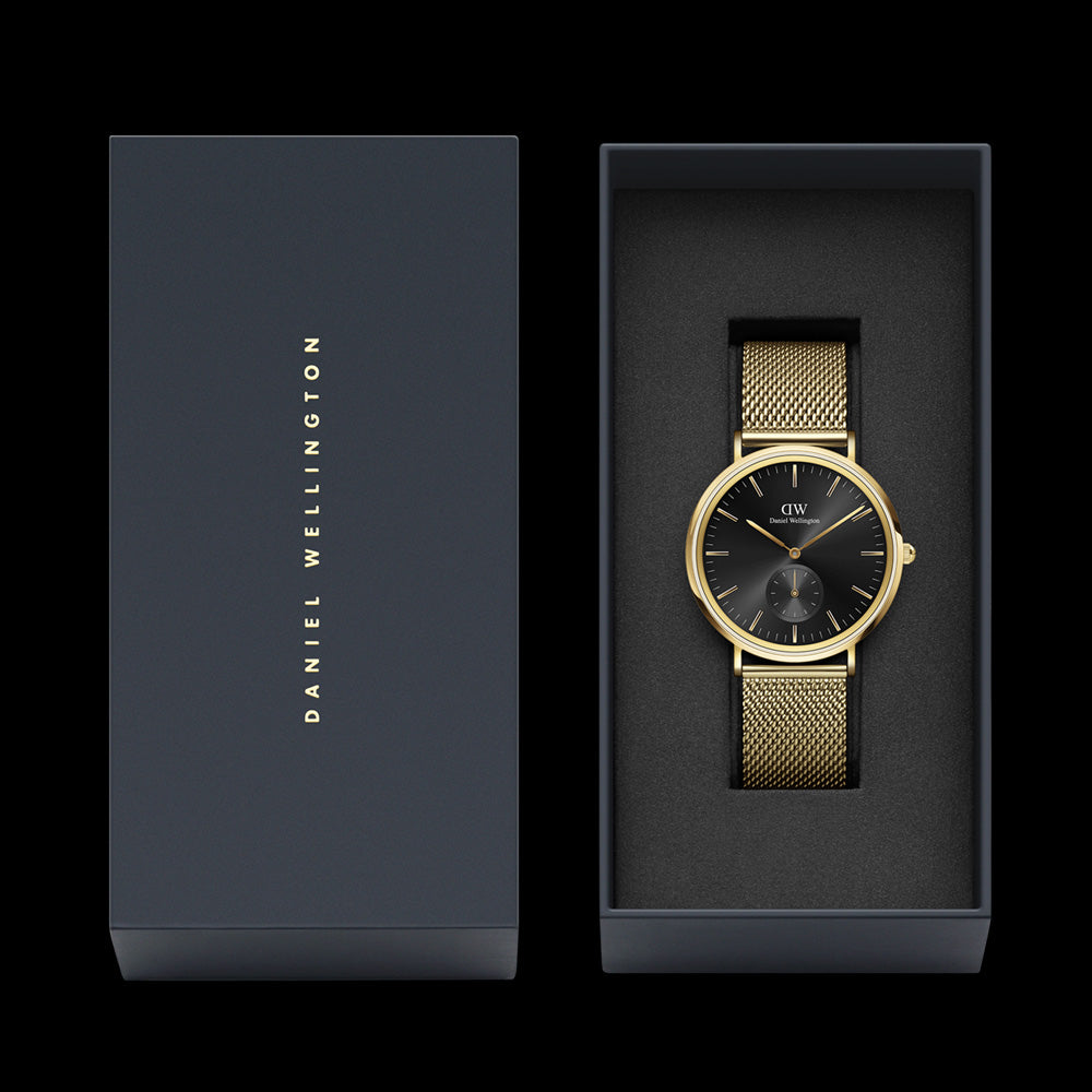 DANIEL WELLINGTON CLASSIC MULTI-EYE GOLD BLACK ONYX DIAL WATCH - PACKAGING