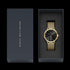 DANIEL WELLINGTON CLASSIC MULTI-EYE GOLD BLACK ONYX DIAL WATCH - PACKAGING