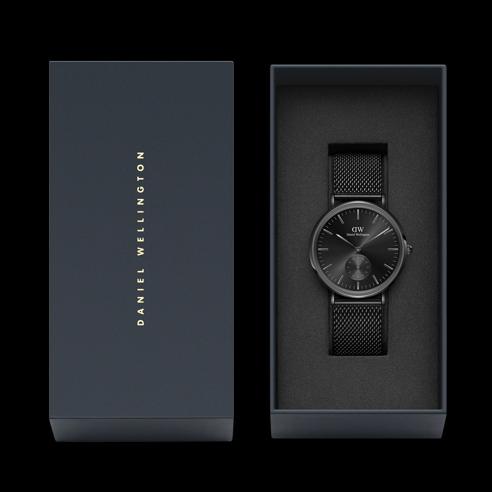 DANIEL WELLINGTON CLASSIC MULTI-EYE ALL BLACK ONYX DIAL WATCH - PACKAGING