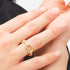 Woman Wearing Daniel Wellington Crystal Link Gold Ring