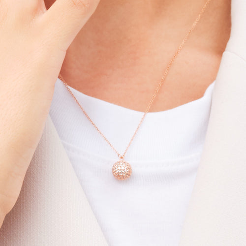 Woman Wearing Daniel Wellington Pave Crystal Rose Gold Ball Necklace
