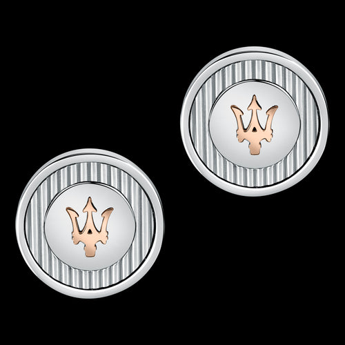 A pair of silver and rose gold Maserati cufflinks with the brand's logo in the centre.