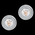 A pair of silver and rose gold Maserati cufflinks with the brand's logo in the centre.