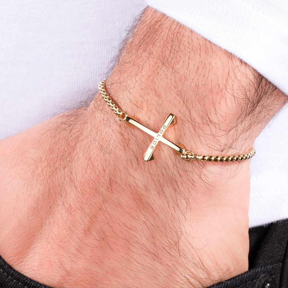 Man wearing Police Gold Cross Bracelet