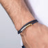 Man wearing Police Bolt Blue Leather Bracelet