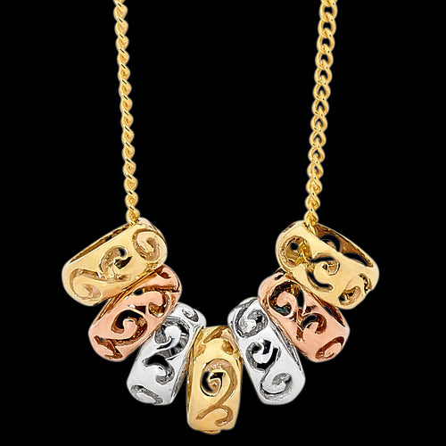 THREE TONE 9 KARAT GOLD SEVEN LUCKY RINGS NECKLACE