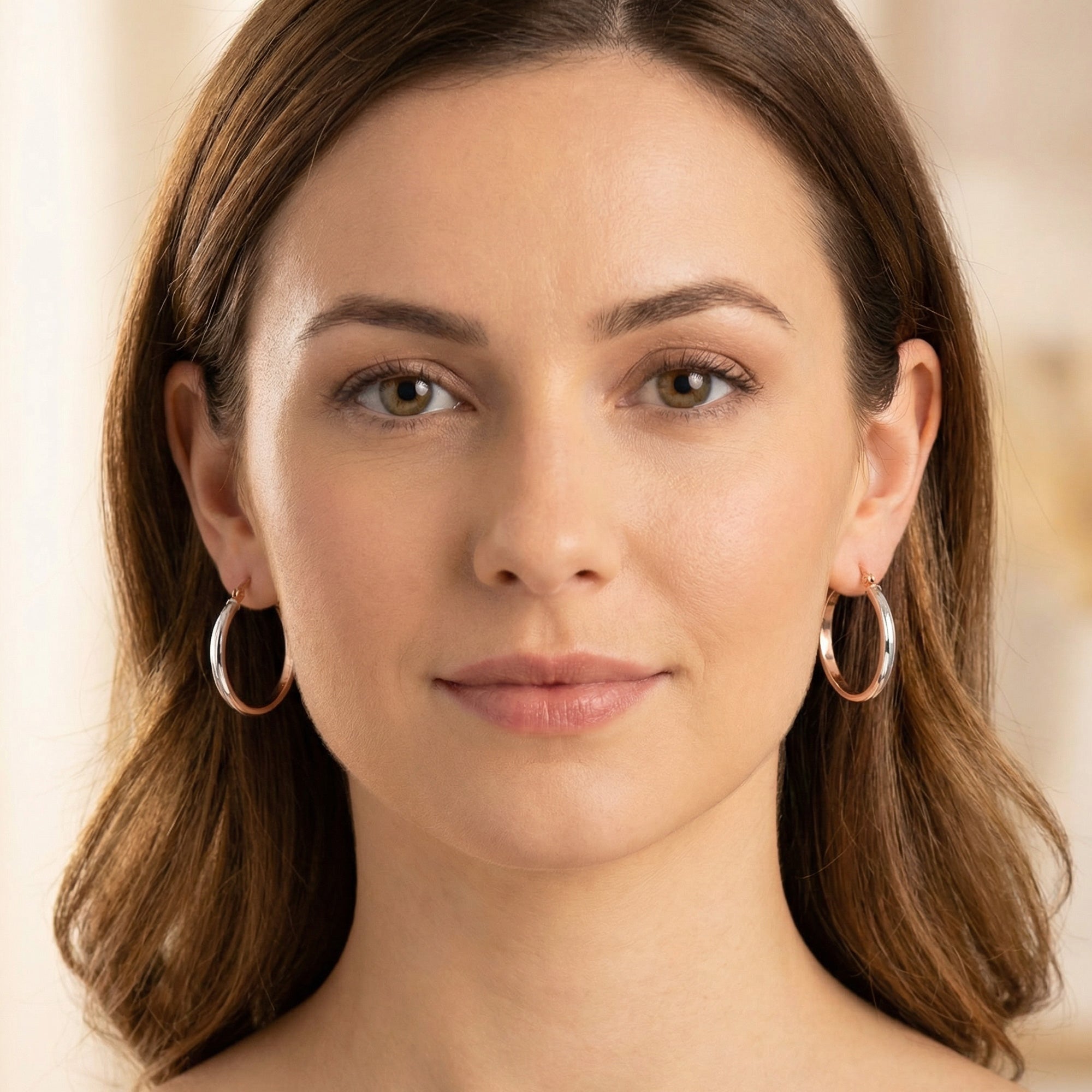 Woman Wearing Tesoro Italian 9 Carat Rose & White Gold Hoop Earrings