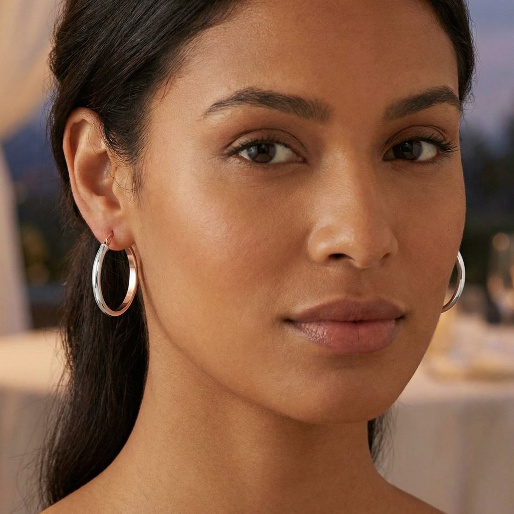 Close Up Wearing Tesoro Italian 9 Carat Rose & White Gold Hoop Earrings