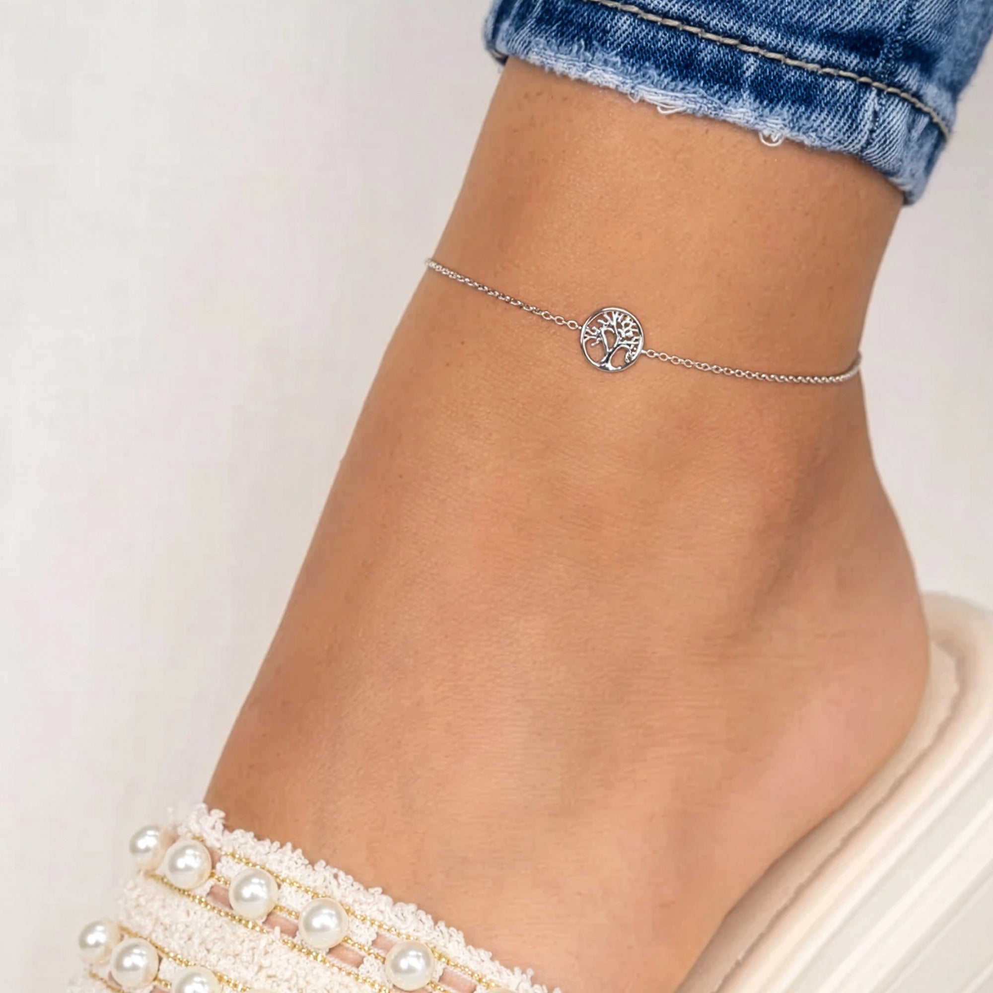 Woman Wearing Woman Wearing Tree Of Life Sterling Silver Anklet