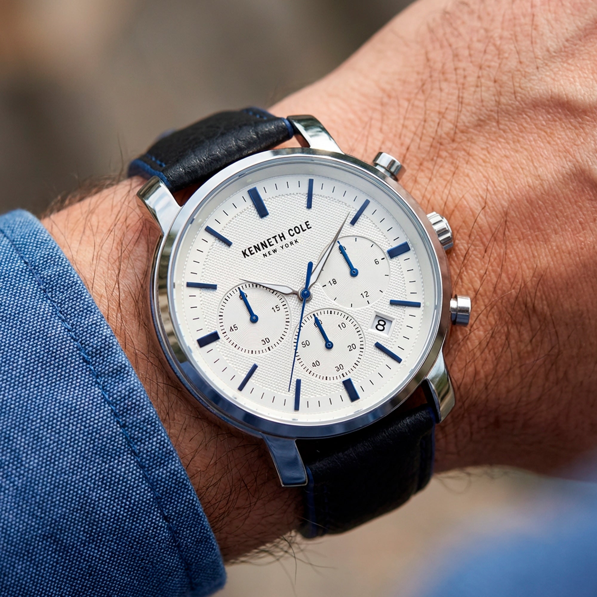 Man Wearing Kenneth Cole Blue Accent Multifunction Men's Watch