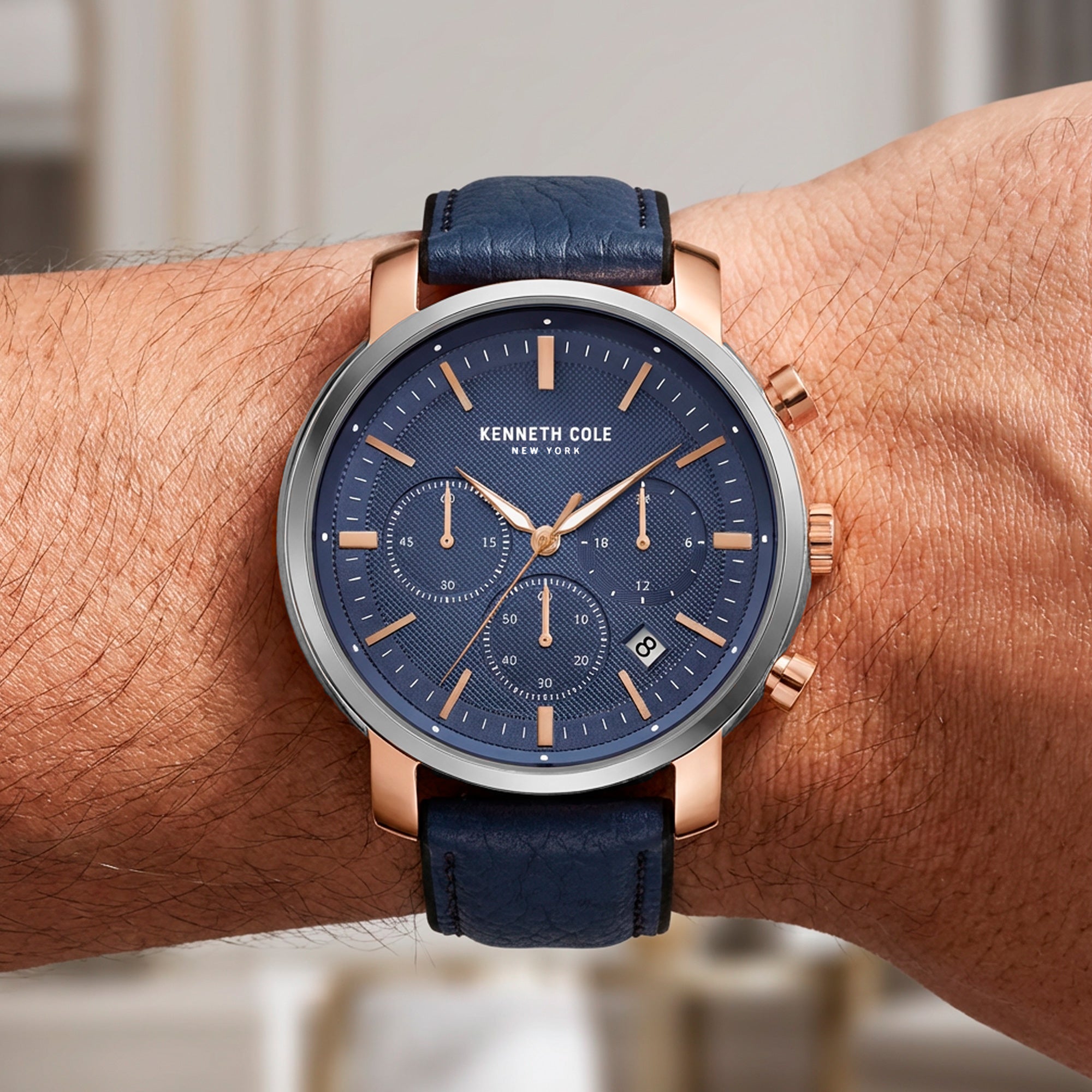 Man Wearing Kenneth Cole Blue Dial Multifunction Men's Watch