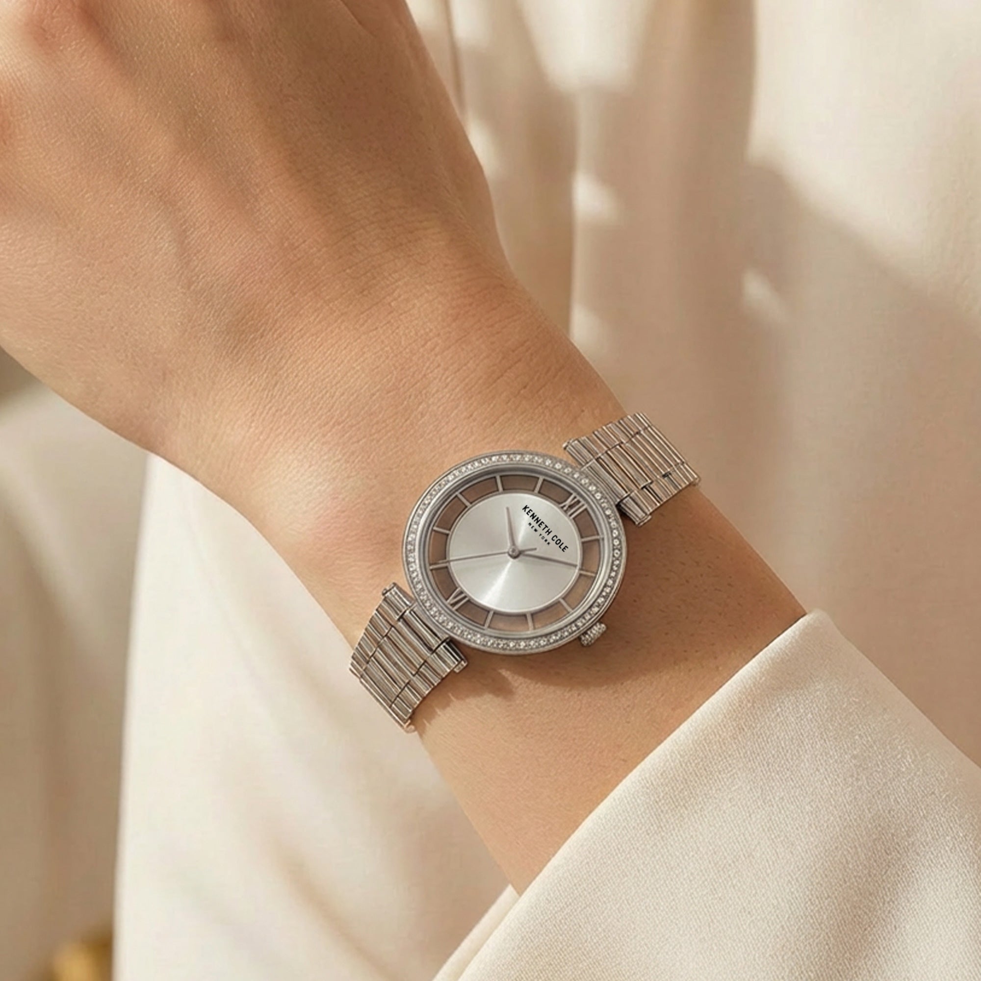 Woman Wearing Kenneth Cole Silver Transparency Gem Halo Ladies Watch