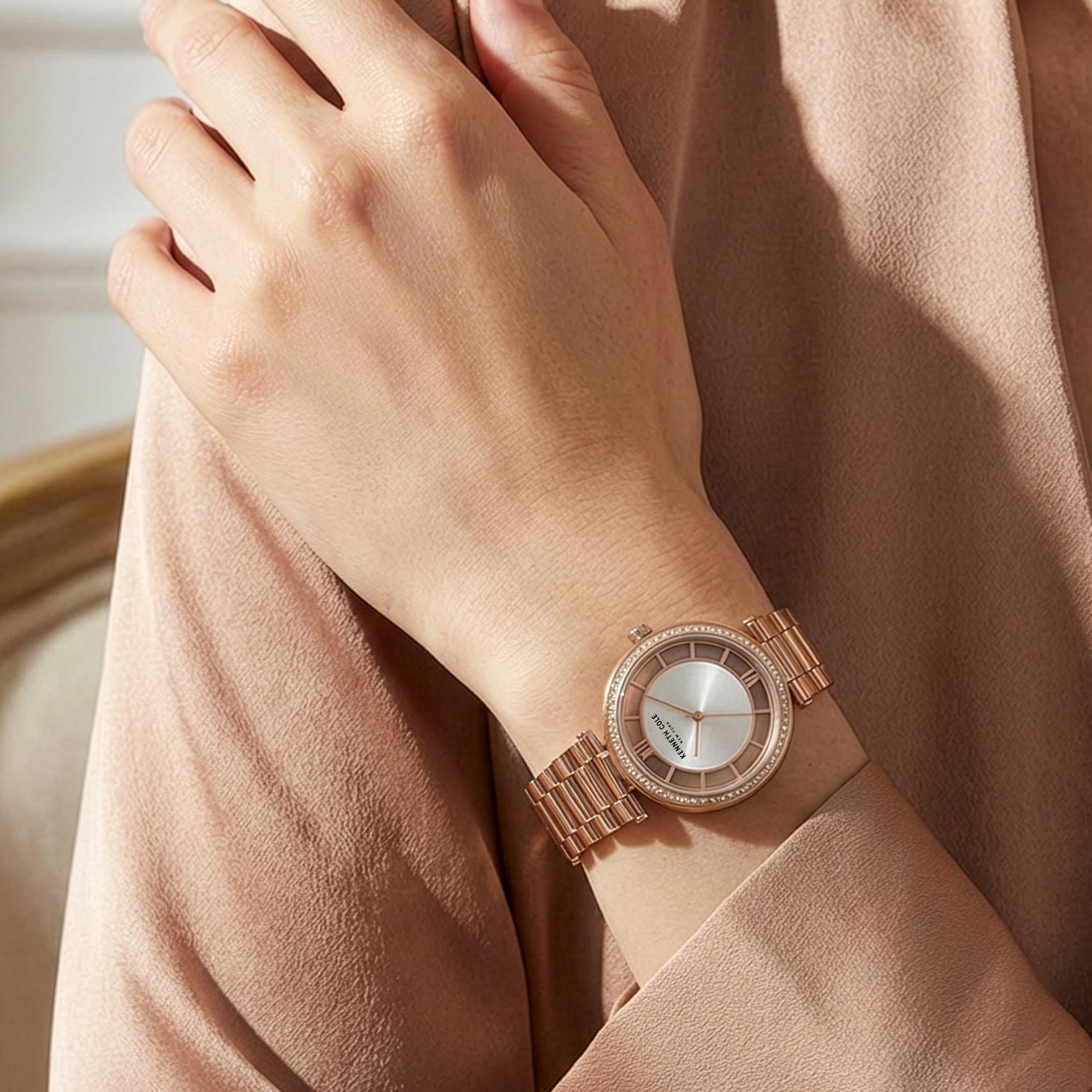 Woman Wearing Kenneth Cole Rose Gold Transparency Gem Halo Ladies Watch