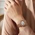 Woman Wearing Kenneth Cole Rose Gold Transparency Gem Halo Ladies Watch