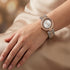 Woman Wearing Kenneth Cole Two Tone Transparency Gem Halo Ladies Watch