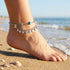 Woman Wearing Tree Of Life Steel Boho Bead Anklet At The Beach