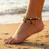 Woman Wearing Windrose Gold Boho Pearl Anklet