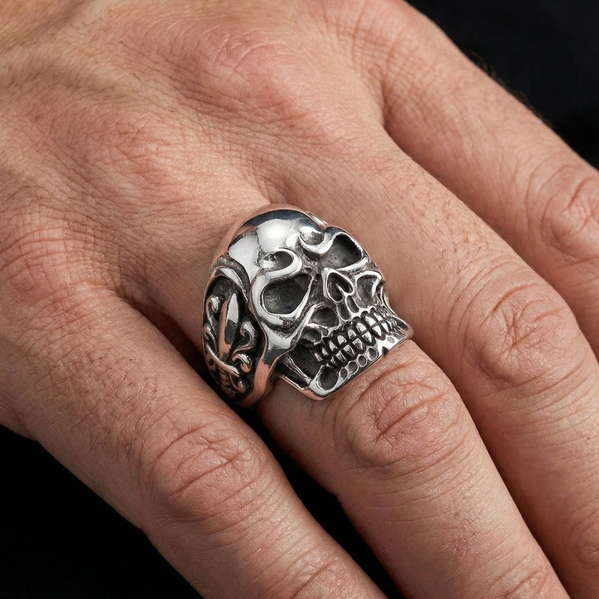 Close Up Man Wearing Sterling Silver Men's Skull Fleur-De-Lis Ring