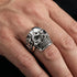 Close Up Man Wearing Sterling Silver Men's Skull Fleur-De-Lis Ring
