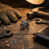 Man Wearing Sterling Silver Men's Sugar Skull Ring ON Wooden Work Bench