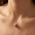 Woman Wearing Tiger Eye Infinity Cage Silver Necklace | Engelsrufer Australia