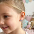 Girl Wearing Silver Muffin Enamel Children's Earrings
