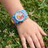 Girl Wearing Colourful Flamingo Children's Watch