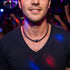 Man Wearing Brown Leather Men's Bead Necklace At A Nightclub