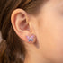 Young Girl Wearing Butterfly Pink & Blue CZ Children's Stud Earrings