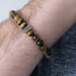 SAVE BRAVE MEN'S STEEL TIGER EYE OM BRACELET - WRIST VIEW