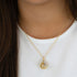 ENGELSRUFER GOLD WHITE PEARL ANGEL WING SOUNDBALL NECKLACE - MODEL VIEW