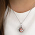 ENGELSRUFER SILVER ROSE GOLD ANGEL WING SOUNDBALL PENDANT - MODEL VIEW