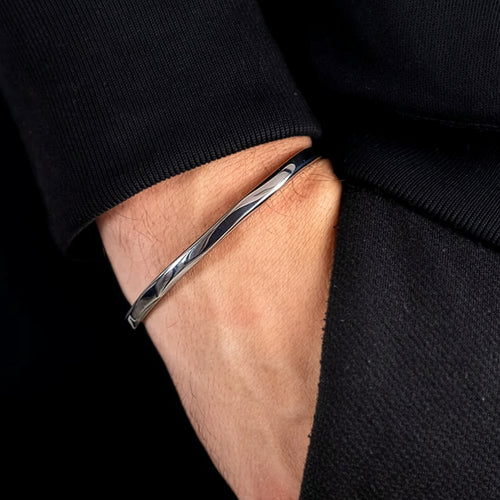 Man Wearing Stainless Steel Ripple Men's Thin Cuff Bracelet