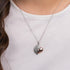 Woman Wearing Sterling Silver & Rose Gold Angel Wing Heart Pendant | Engelsrufer Australia