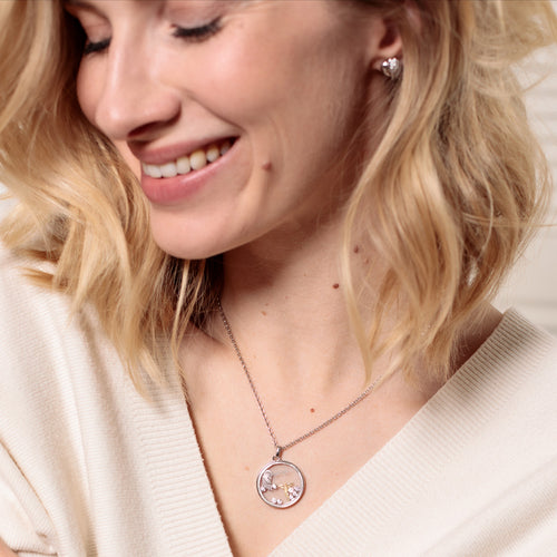 Woman Wearing Gold Angel & Wing Charm Glass Locket Necklace | Engelsrufer Australia