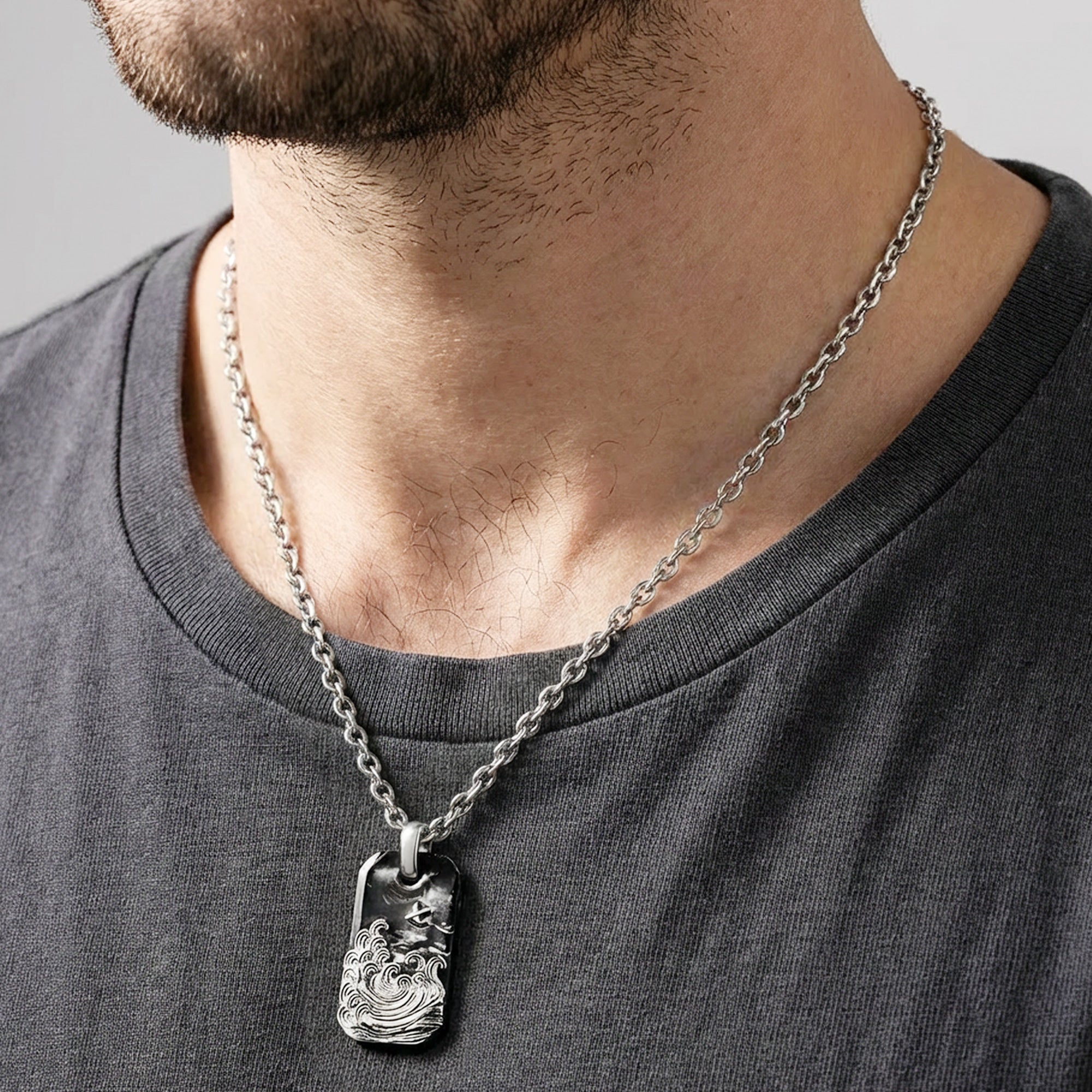 Man Wearing Save Brave Midnight Ocean Steel Necklace