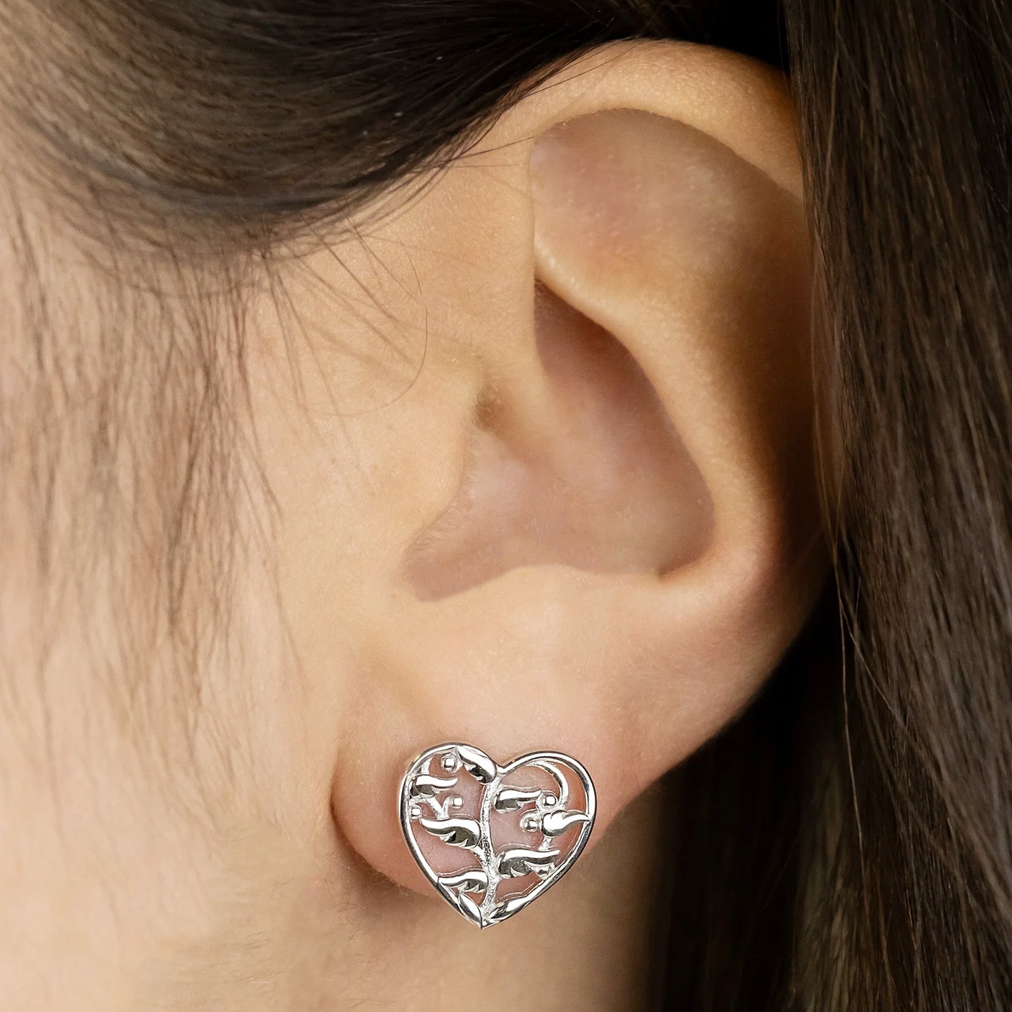 Woman Wearing Sterling Silver Angel Wing Tree Of Life Earrings