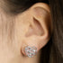Woman Wearing Sterling Silver Angel Wing Tree Of Life Earrings