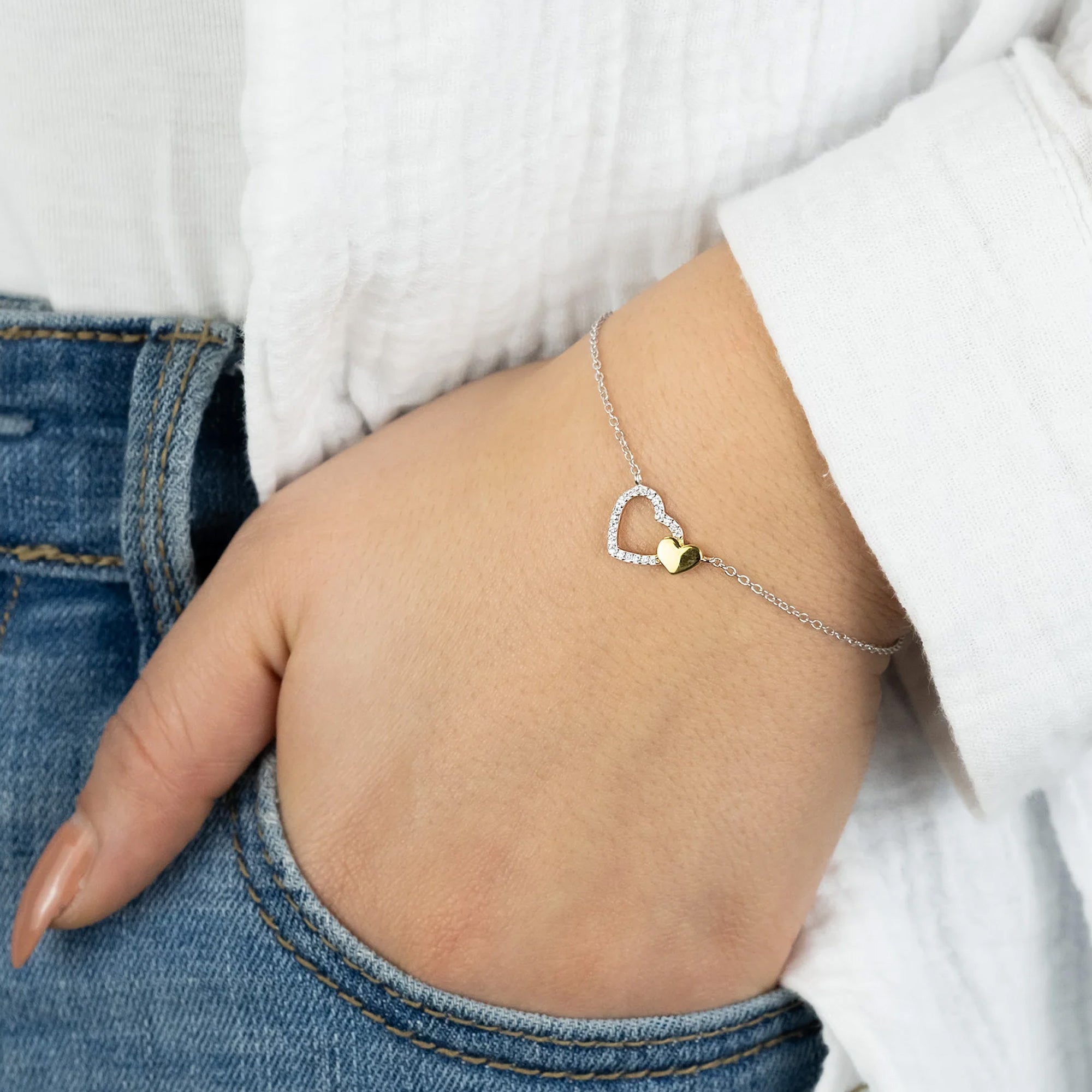Woman Wearing Silver & Gold Heart Beat CZ Bracelet