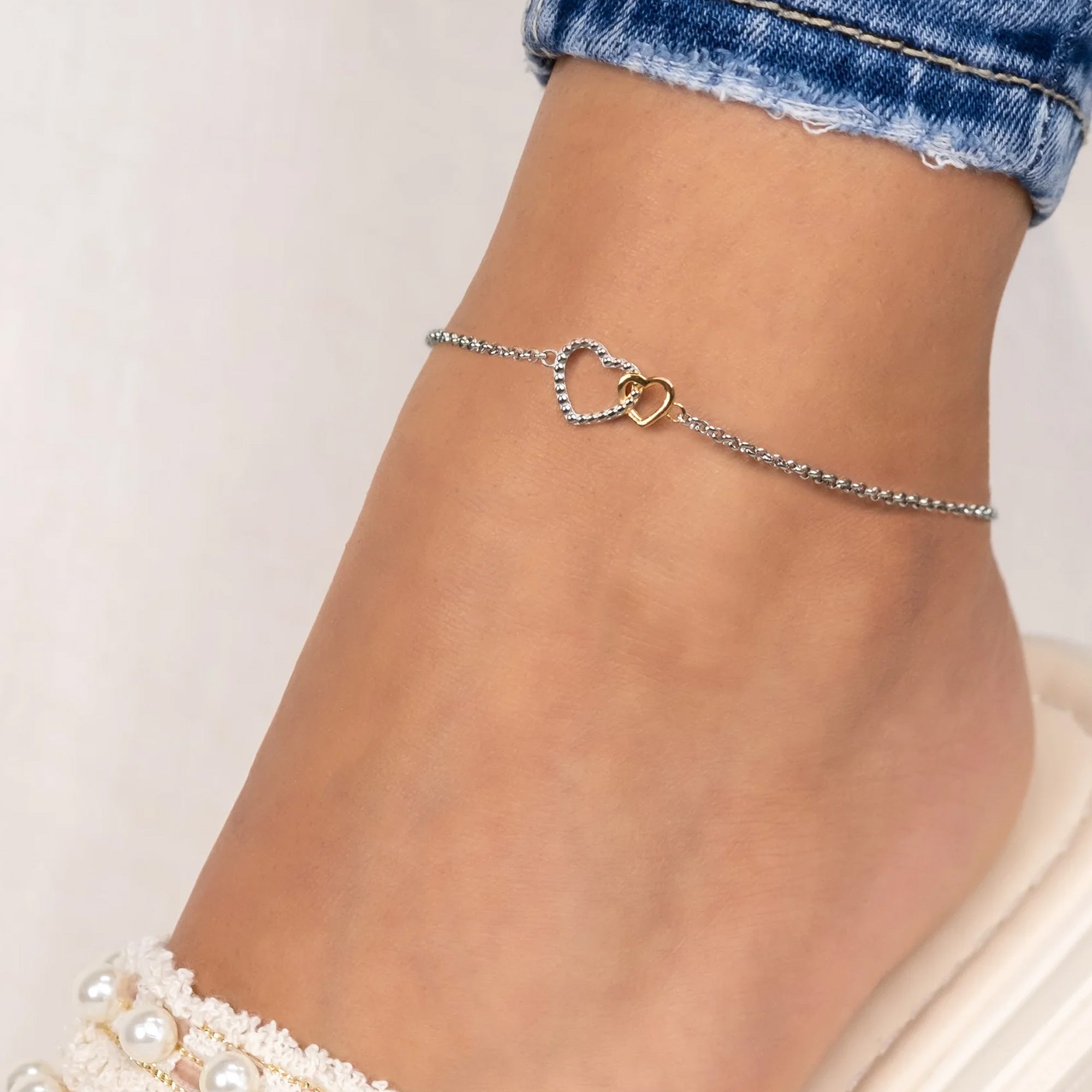 Woman Wearing Stainless Steel Two Hearts Anklet