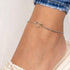 Woman Wearing Stainless Steel Two Hearts Anklet