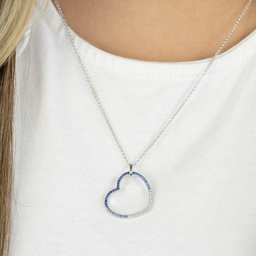 Woman Wearing Sterling Silver Ocean Blue Heart CZ Necklace
