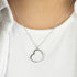 Woman Wearing Sterling Silver Dark Shade Heart CZ Necklace