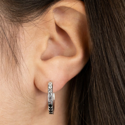 Woman Wearing Dark Shade CZ Sterling Silver 21mm Hoop Earrings