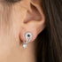 Woman Wearing Sterling Silver Yin Yang Balance Earrings