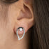 Woman Wearing Sterling Silver Dark Shade Yin Yang Balance CZ Earrings