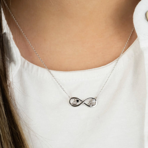 Woman Wearing Sterling Silver Yin Yang Buddha Om Infinity CZ Necklace