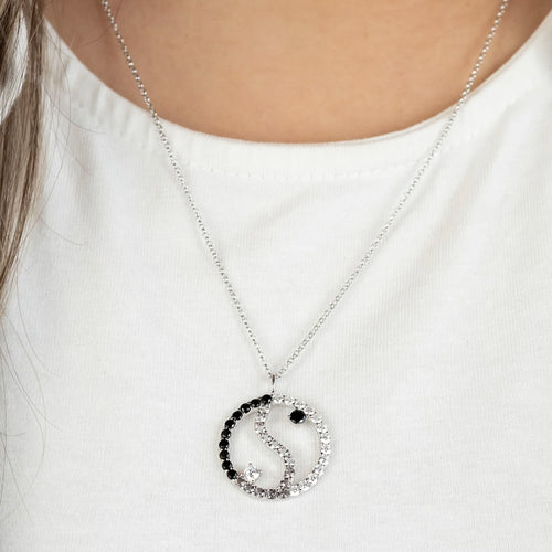 Woman Wearing SterlingSilver Dark Shade Yin Yang Balance CZ Necklace